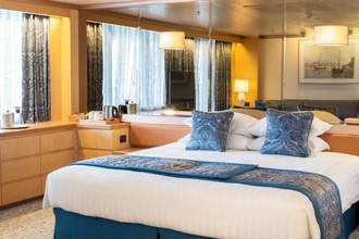 Fred. Olsen Cruise Line Borealis Premier Suite Bedroom.jpg